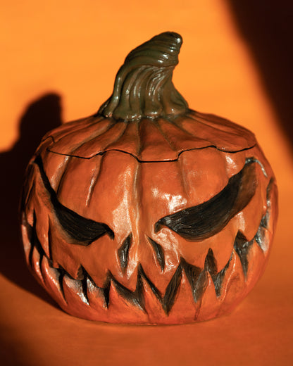 Two-faced pumpkin head resin jar