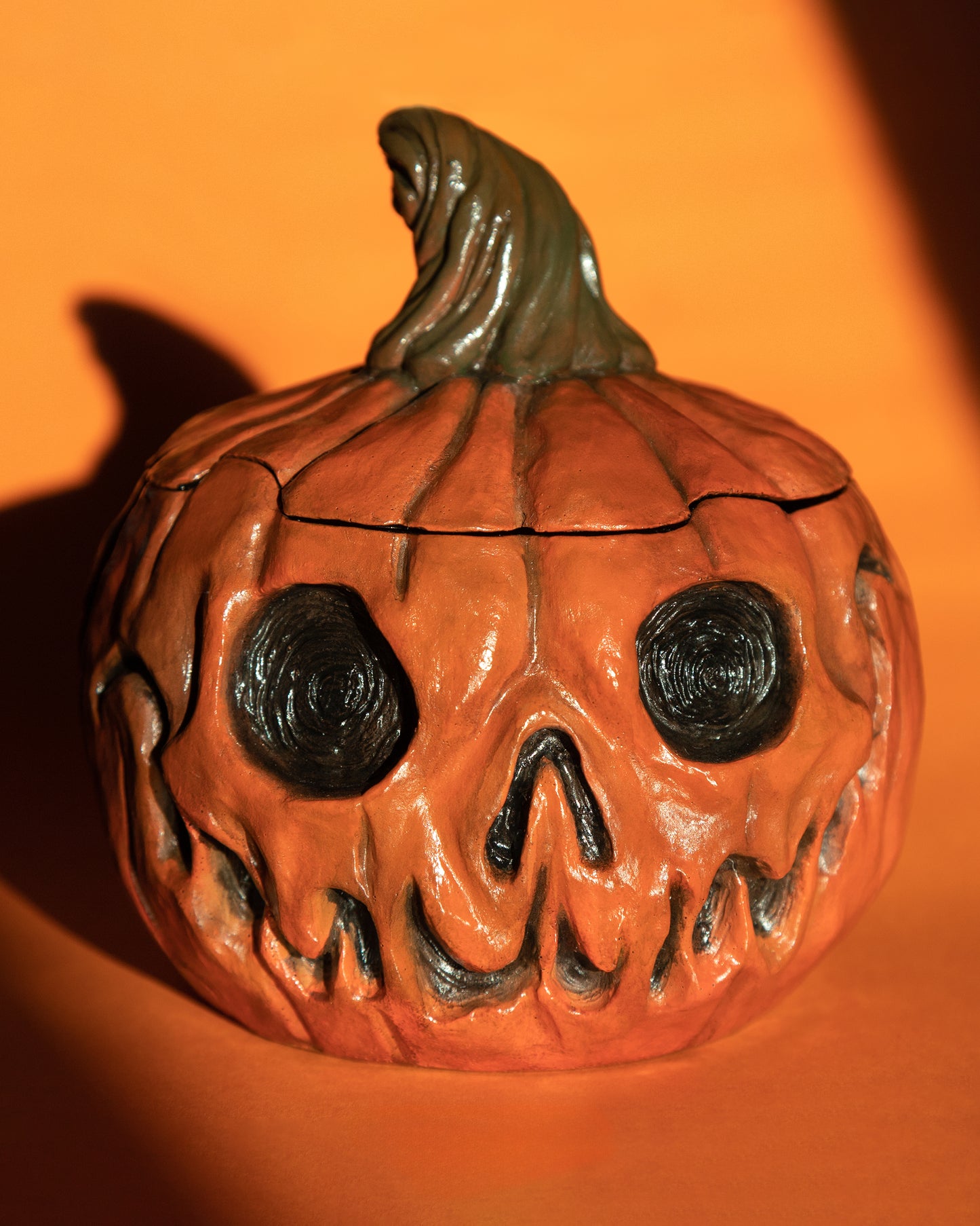 Two-faced pumpkin head resin jar
