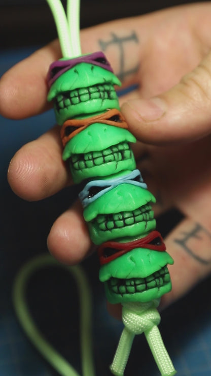 Set of 4 glow in the dark turtle skull beads